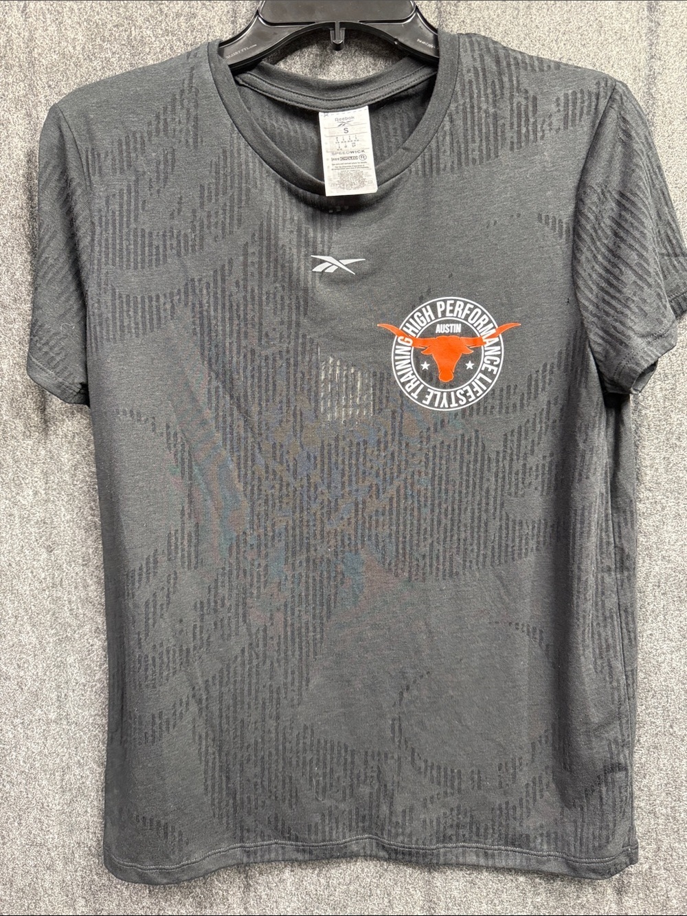 Reebok Black Short-Sleeve Performance Tee with Orange Austin Emblem